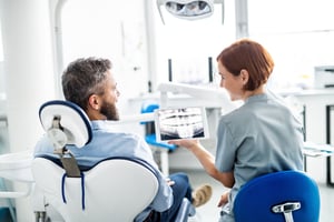 Female RDH Dentist with Male Patient